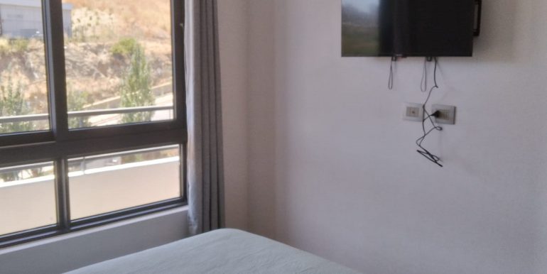 tv dormitorio